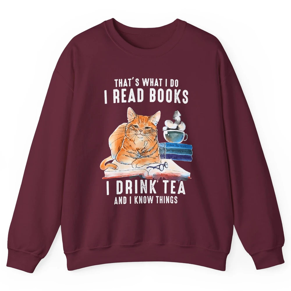 Funny That What I Do I Read Books Drink Tea And I Know Things Sarcastic Orange Cat Book Reader Kitten Bookworm Unisex Crewneck Sweatshirt