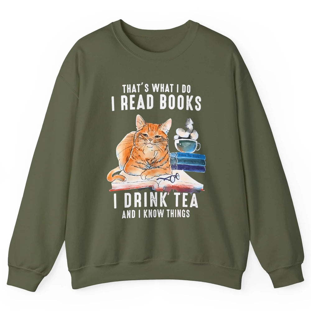 Funny That What I Do I Read Books Drink Tea And I Know Things Sarcastic Orange Cat Book Reader Kitten Bookworm Unisex Crewneck Sweatshirt