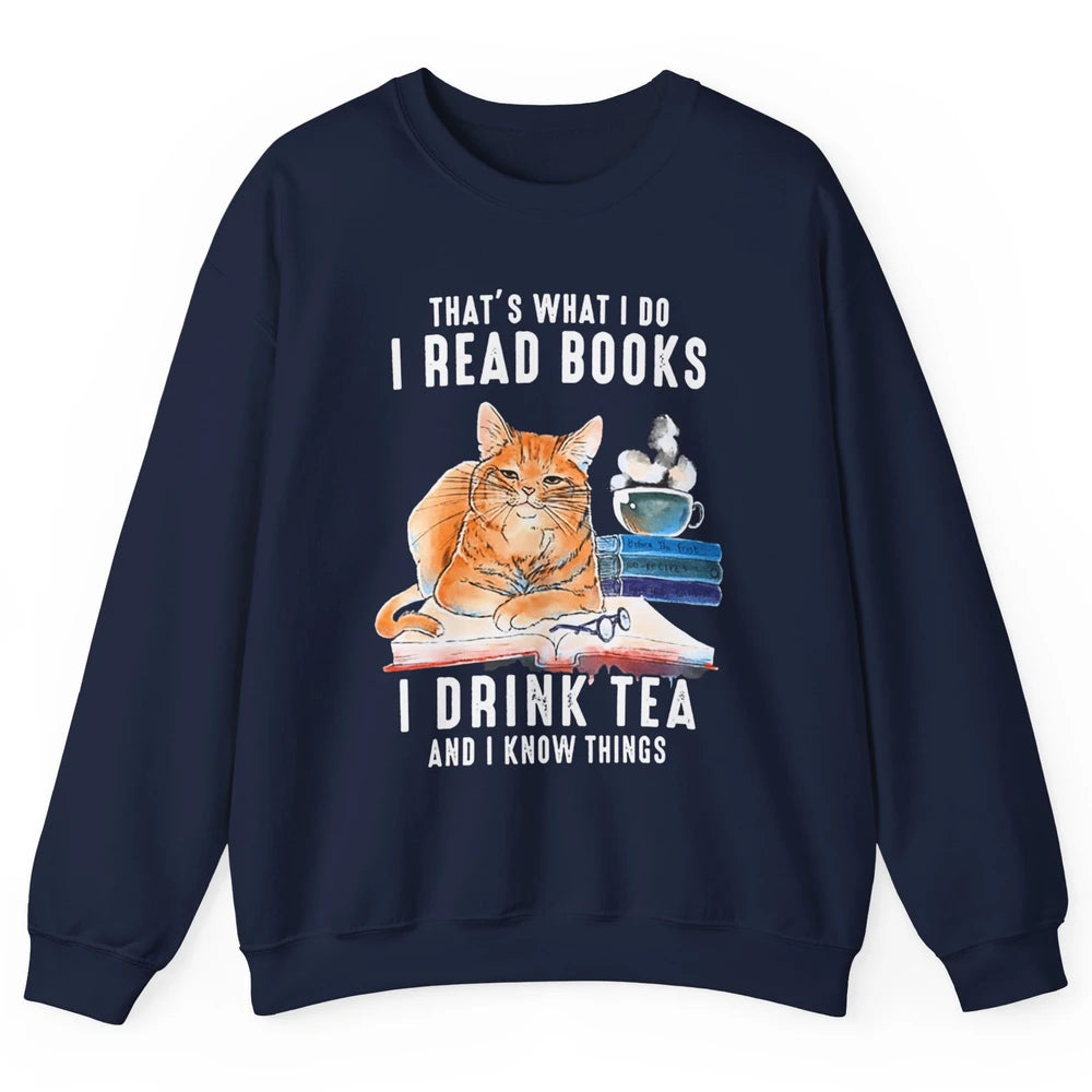 Funny That What I Do I Read Books Drink Tea And I Know Things Sarcastic Orange Cat Book Reader Kitten Bookworm Unisex Crewneck Sweatshirt